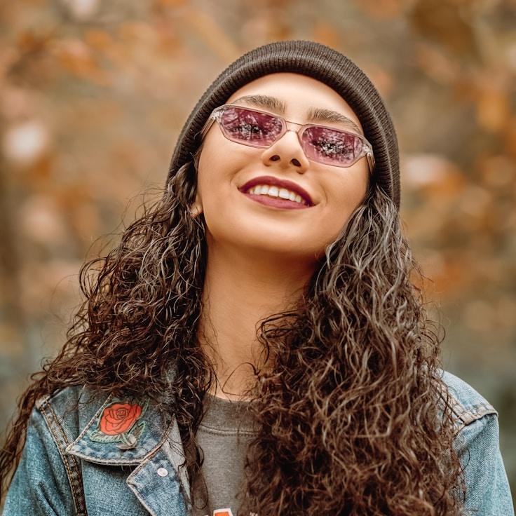 Alicia Shah, Lead Design Curator at Celestial Planet Hub, reviewing corporate floral arrangements